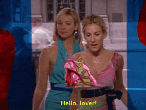 Carrie Bradshaw adoring new shoes in store.